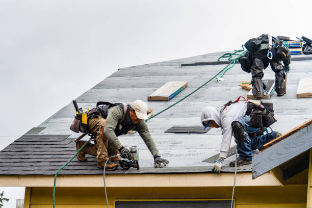 Professional Gutter Installation technician working in Syosset, NY